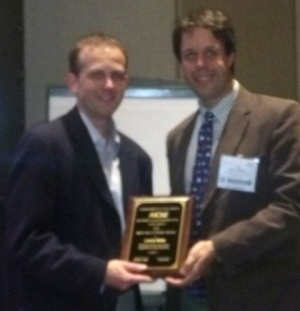 Neil Forbes, U Mass presenting the 15 D/E Plenary Lecture Award to Lonnie Shea, Northwestern Univ.