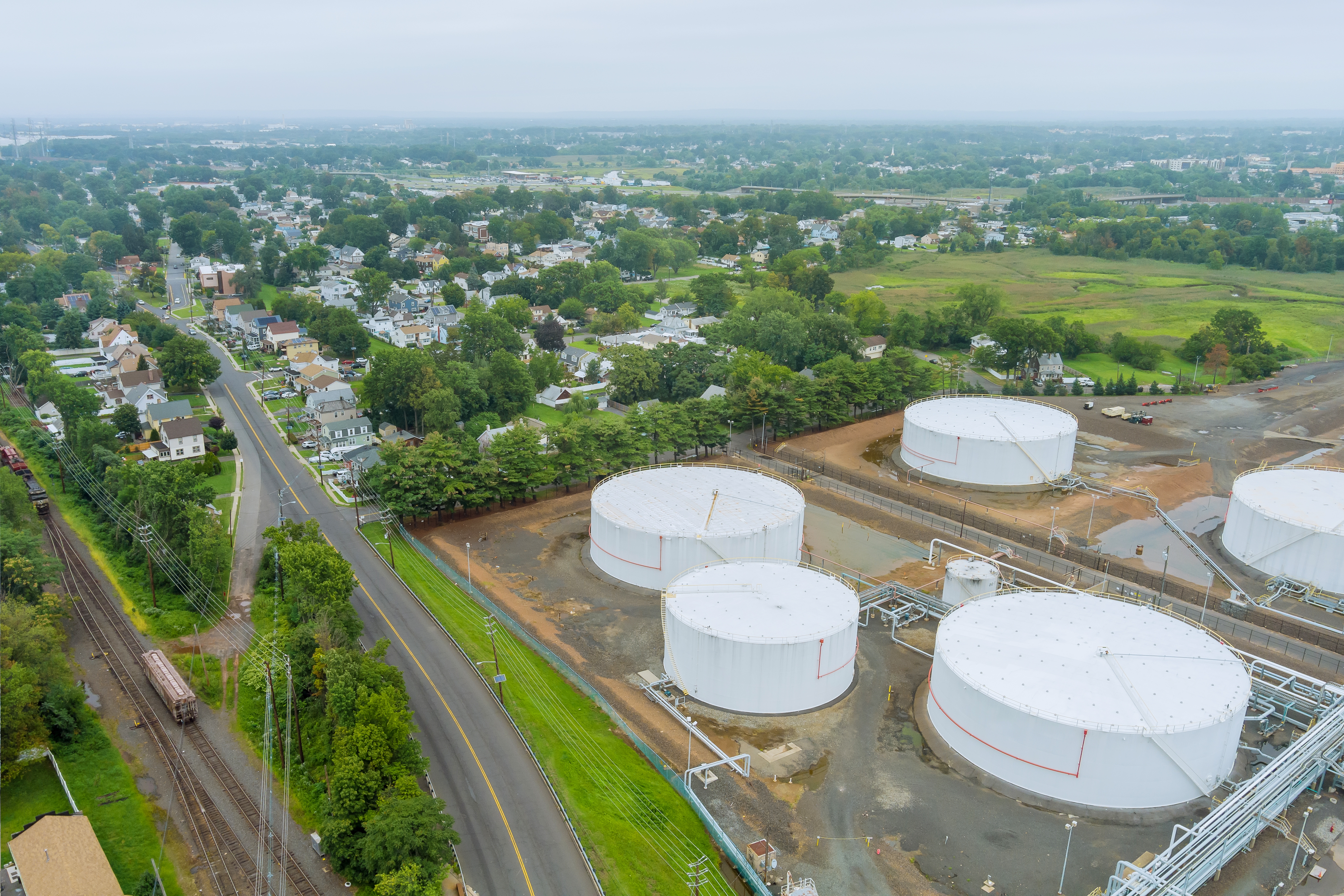 Photo: Woodbridge NJ: Homes and tankage and shipping, side by side.