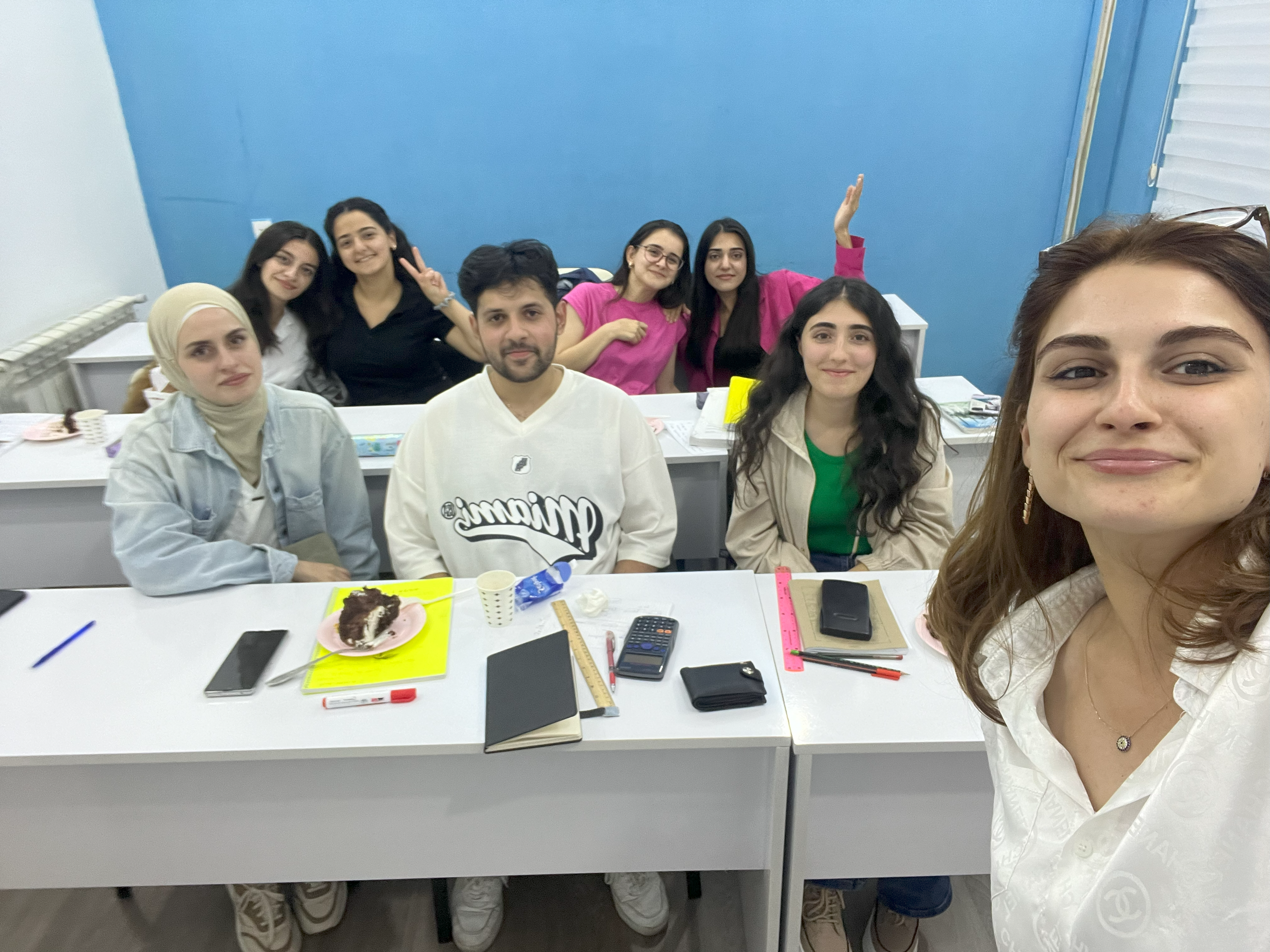 Taliya with students at the educational center she opened, TamTech Academy.