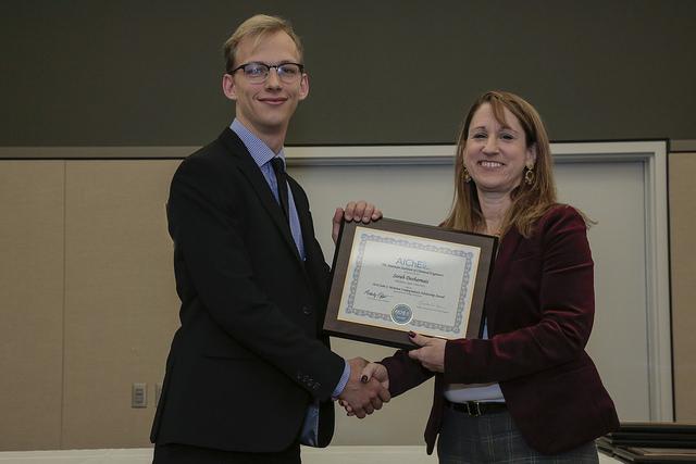 Joshua Sallee accepted the award at the AIchE 2018 Annual Student Conference on behalf of Sarah Desharnais.