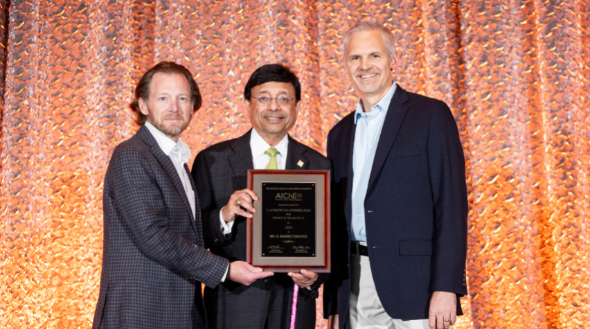 2024 AIChE President Alan Nelson (left), and The Dow Chemical Company's Dan Hickman (right) presented S. Shariq Yosufzai (center) with the F. J. and Dorothy Van Antwerpen Award at the 2024 Annual Meeting Honors Ceremony.