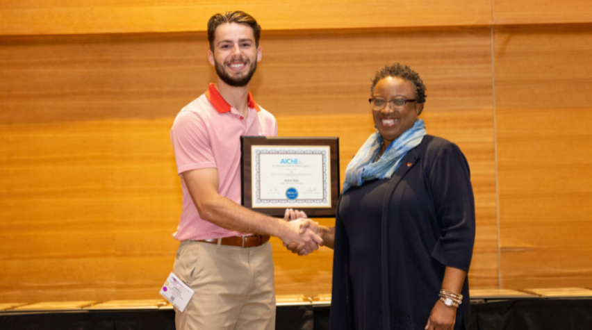 AIChE president Christine Grant presented Andrew Berley with the John J. McKetta Undergraduate Scholarship award at the AIChE 2022 Annual Student Conference.