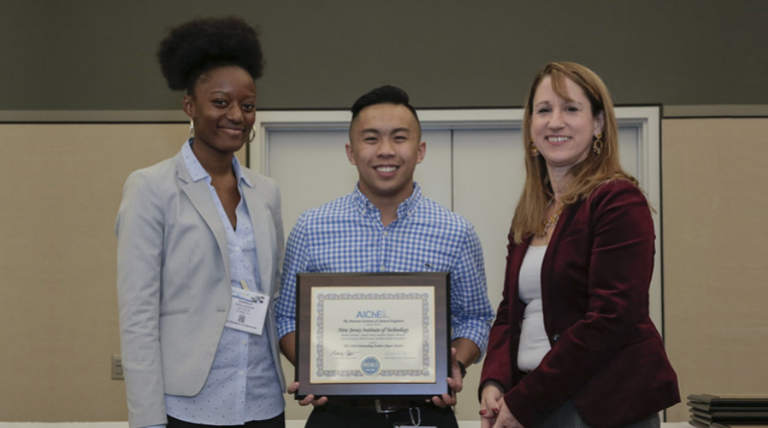NJIT Student Chapter members accepting an Outstanding Student Chapter Award during the 2018 Annual Student Conference. Photo by Margot Hartford.