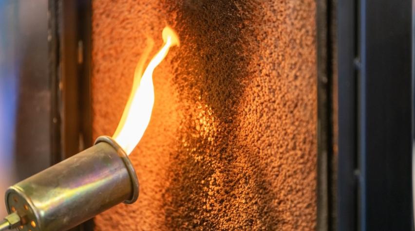 Flame-retardant material can prevent the start of a fire. Here, a material is being exposed to a direct flame to test it for flame-retardant properties.